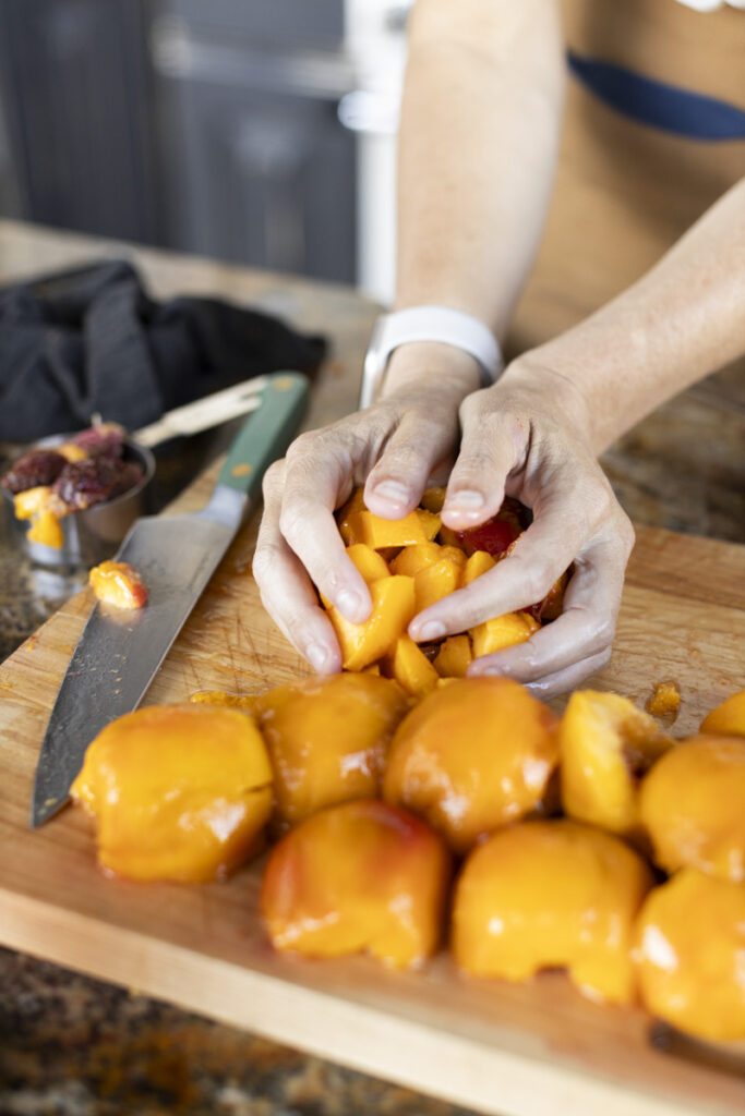 cutting peaches