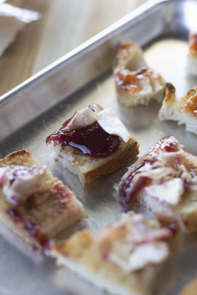 raspberry jam with ricotta and prosciutto on toast