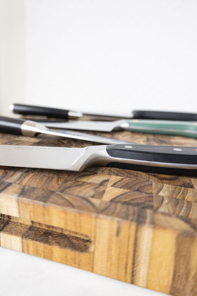 chef's knives on endgrain chopping block