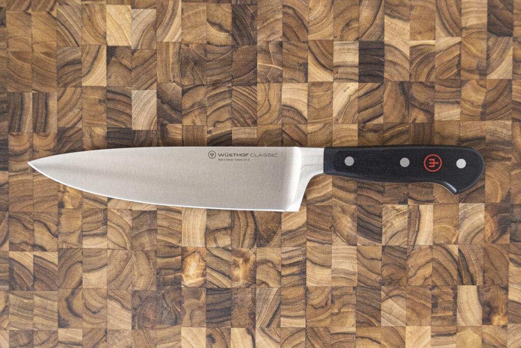 wusthof chef knife on a endgrain chopping block